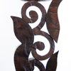Patinated hammered copper over carved wood